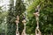 Cheerleader girls doing tricks outdoors