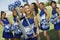 Cheerleader Holding Trophy