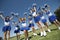 Cheerleaders Cheering On Field