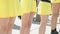 Cheerleaders girls dressed in yellow costumes