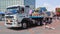 Cheerleaders performing in the back of a truck during a parade