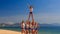 cheerleaders in white blue show half stunt pyramid on beach