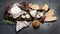 Cheese assortment on dark background