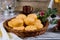 Cheese bread, chipa with coffee and flowers