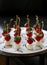 Cheese canapes with cherry tomatoes