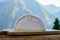 Cheese collection, French reblochon de savoie cheese served outdoor in Savoy region, with Alpine mountains peaks on background