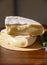 Cheese collection, French reblochon de savoie gratin cow milk cheese close up