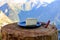 Cheese collection, French tomme de savoie or tome des bauges cheese served outdoor with Alpine mountains peaks on background