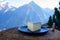 Cheese collection, French tomme de savoie or tome des bauges cheese served outdoor with Alpine mountains peaks on background