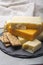 Cheese collection, matured and orange original British cheddar cheese in blocks served with crackers