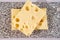 Cheese collection, semi-hard French cheese emmentaler with round holes made from cow milk