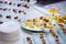 Cheese with dried fruit, nuts and honey, snack on a plate, cater