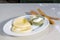 Cheese dumpling on the white plate, souse in green bowl. Georgian traditional food