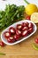 Cheese filled cherry peppers on wooden background.