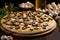 cheese-filled mushrooms arranged on a pizza stone