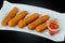 Cheese fingers with delicious ketchup and accompaniments to your liking