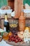 Cheese and fruits on a beautifully vintage decorated table