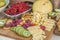 Cheese and fruits on a beautifully vintage decorated table