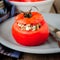 A Cheese and Green Olive Stuffed Tomato