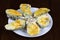 Cheese grilled oyster on dish with dark background