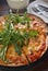 Cheese mushroom rocket paprika pizza pie