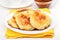 Cheese pancakes with yellow raspberry confiture