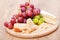 Cheese parmesan and brie with grape