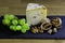 Cheese plate, a large triangle of cheese with spices, grapes and walnuts in the shell