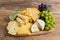 Cheese plate variation on a wooden table