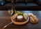 Cheese plate and wine including chardonnay, gourmet crackers