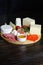 Cheese platte with different cheeses, meats on wooden board