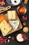 Cheese platter. Blue cheese, Brie, Emmental and others with wine, shot from the top