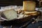 Cheese platter of chopped Spanish hard cheese manchego and sliced Italian pecorino toscano