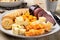 Cheese platter with crackers and sausage