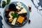 Cheese platter with different cheeses, berries and nutsle background