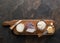 Cheese platter with different homemade organic cheeses on stone background. Top view