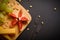 Cheese platter with hard cheese pieces, grapes, pine nuts segmented fig berry on wooden board served with fruit forks