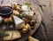 Cheese platter with organic cheeses, fruits, nuts and wine on wooden background. Tasty cheese starter