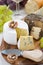 Cheese platter, snacks, bread and wine, close-up