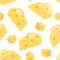 Cheese seamless pattern. Pieces of yellow cheese isolated on a white background. Cubes and triangular pieces of cheese.
