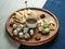 Cheese serving set on wooden Board