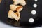 Cheese snacks served in black plate