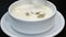 Cheese soup with sliced champignon mushrooms