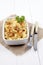 Cheese spaetzle with roasted onions and parsley