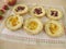 Cheese tartlet with strawberry jam and peach jam