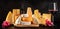 Cheese and wine panorama with many different types of cheese