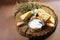 Cheese wooden board. Assortment of cheese, cheese with blue mildew, Camembert or brie cheese circle, Cheese Serving Knife. top vie