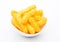Cheese yellow corn snacks in white bowl
