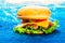 Cheeseburger closeup on a blue background