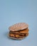 Cheeseburger made from cardboard. Unhealthy eating or fast food concept